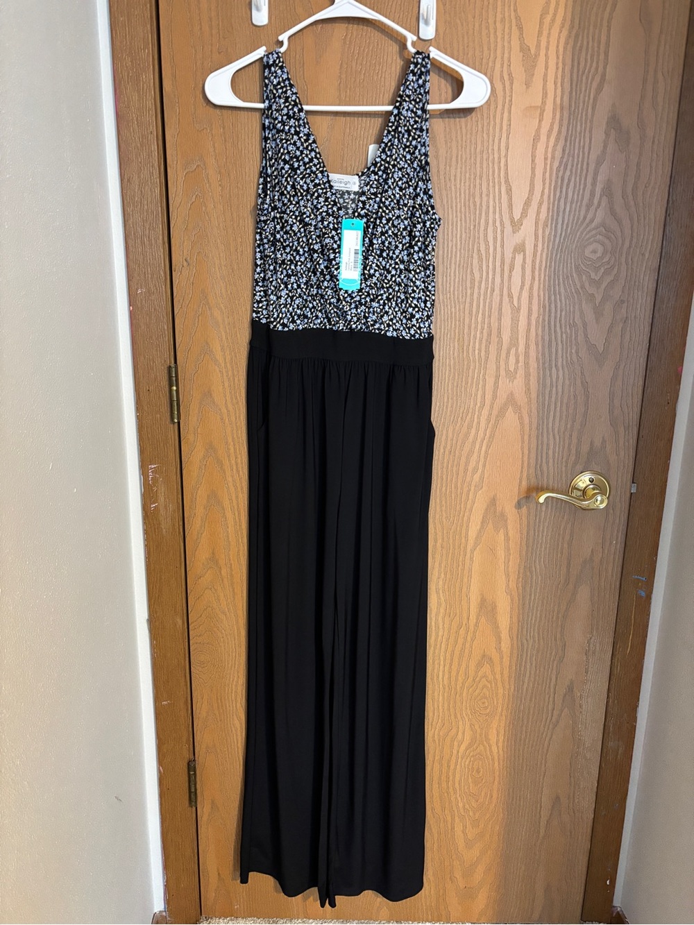 Kaileigh - StitchFix Black Jumpsuit with Pale Blue and Cream Floral Print